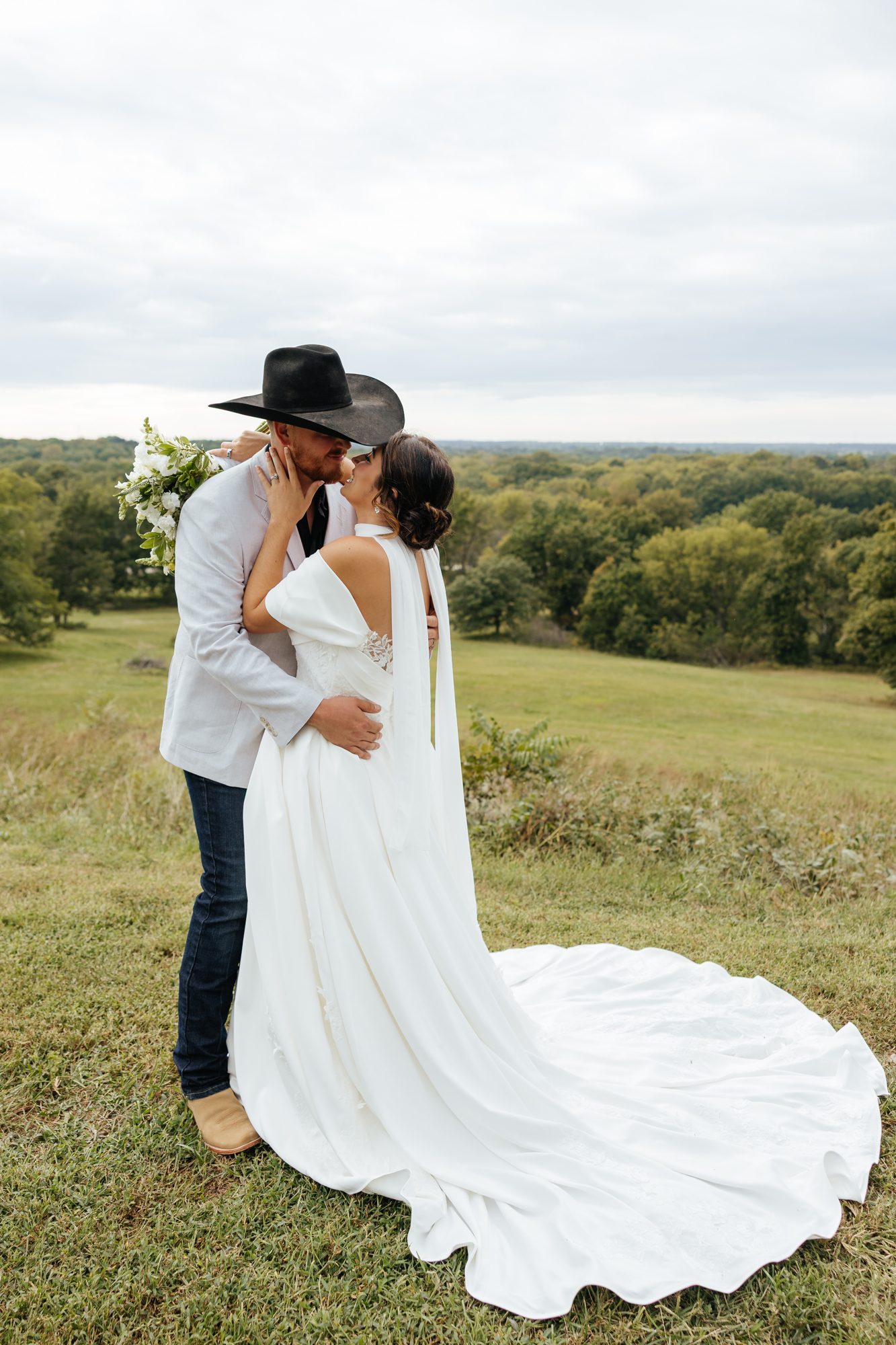 Couple embracing in a field