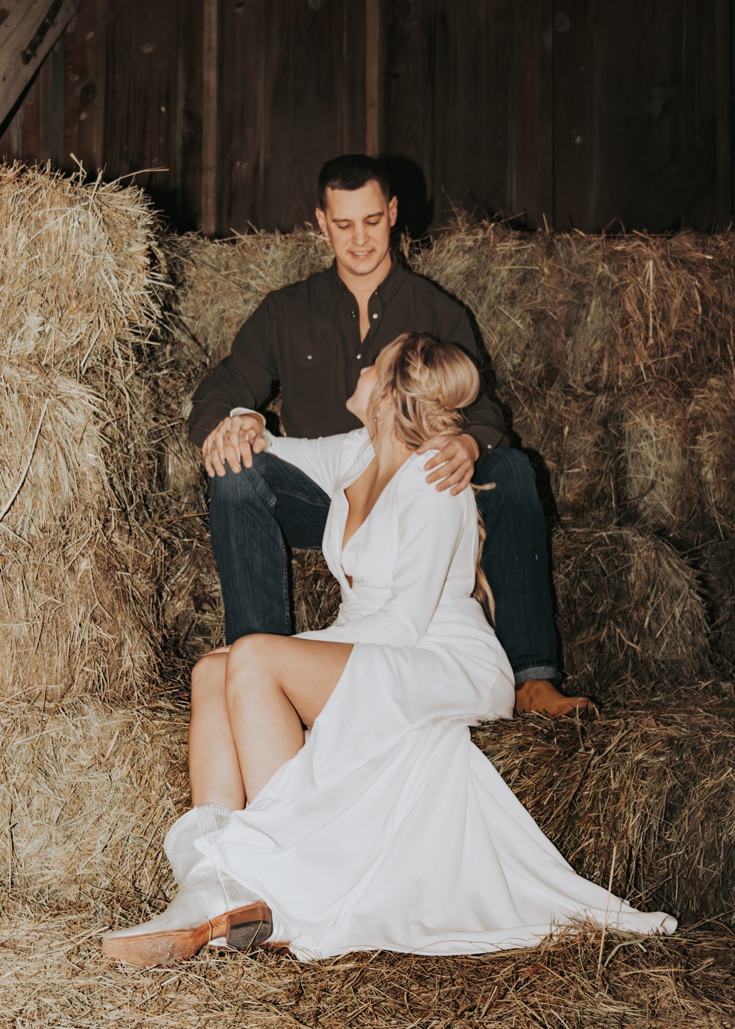 Rustic hay-bale couple portrait